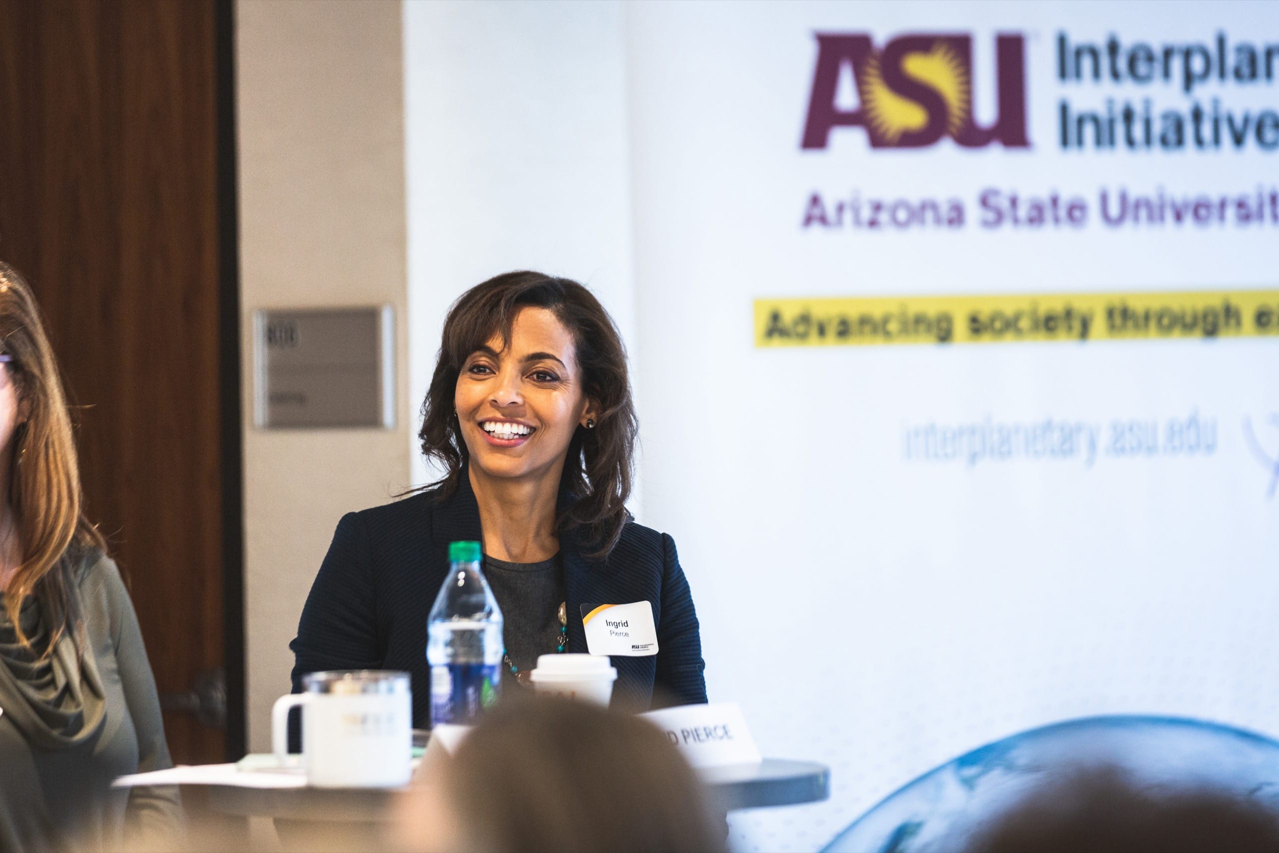 Woman smiling at ASU event