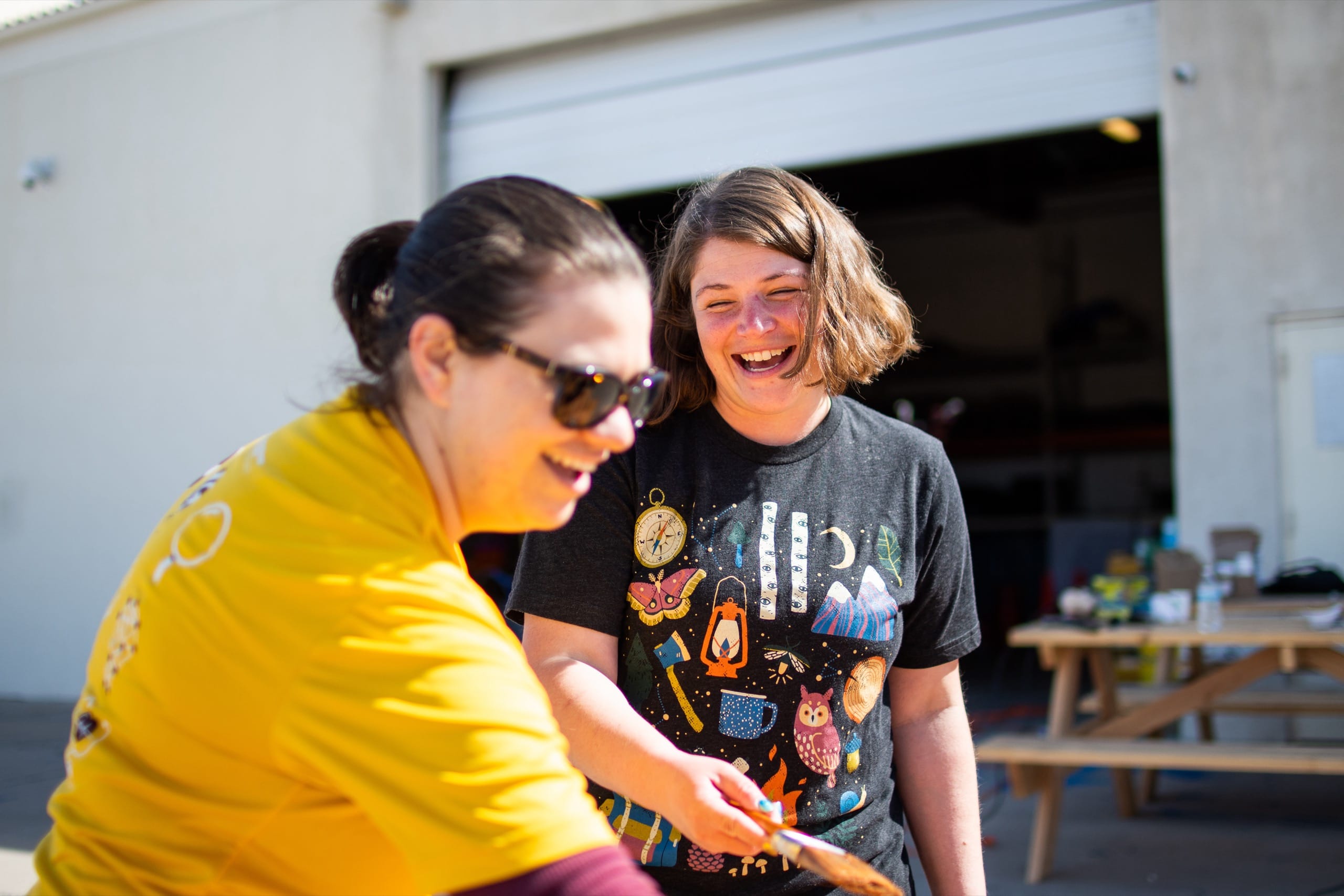 Two people laughing