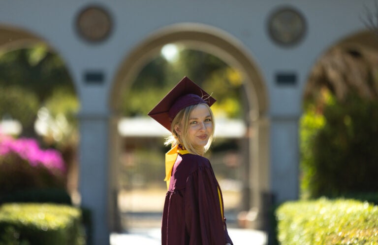 Madison Davis in graduation cap and gown